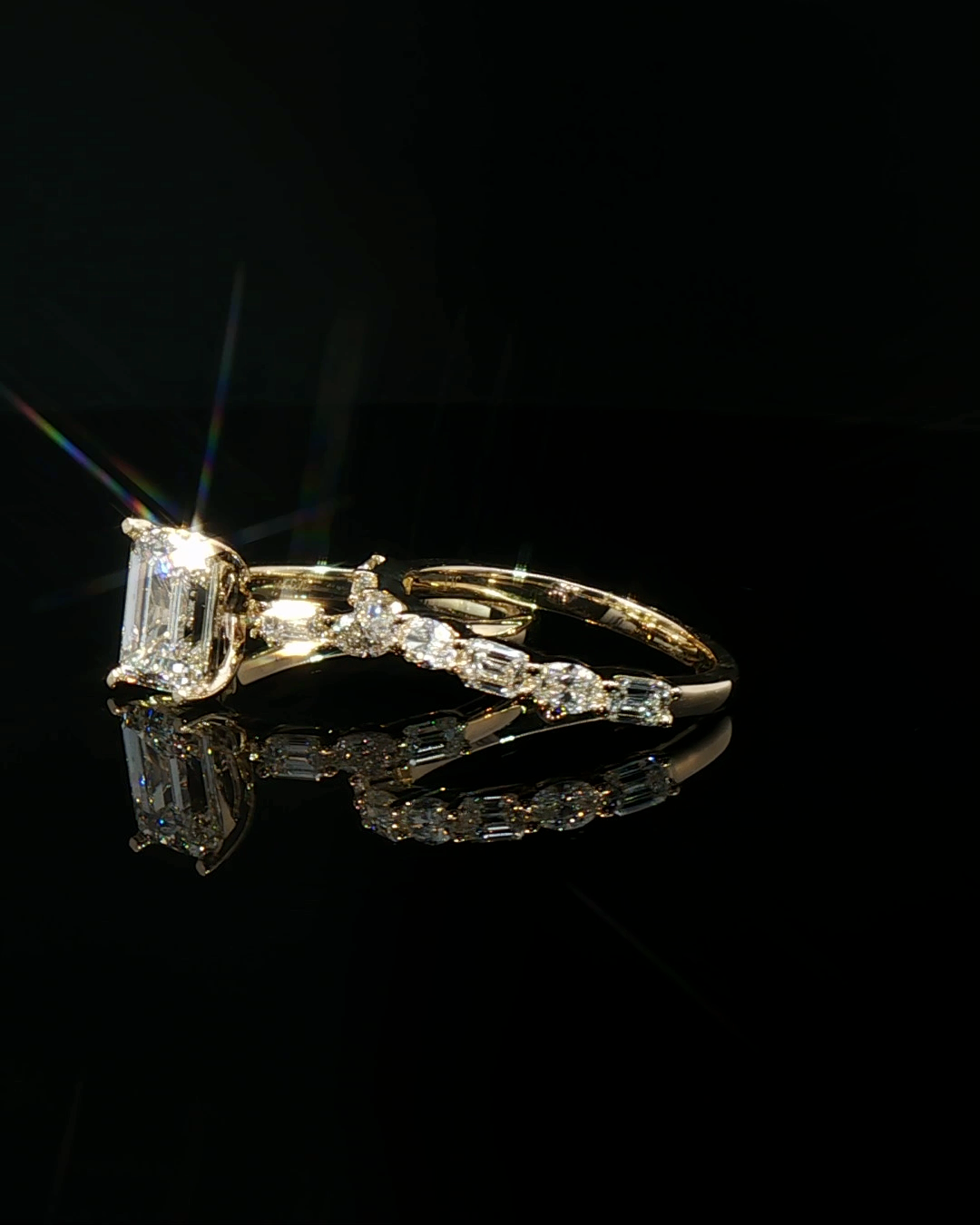 emerald cut diamond multistone custom engagement ring yellow gold side