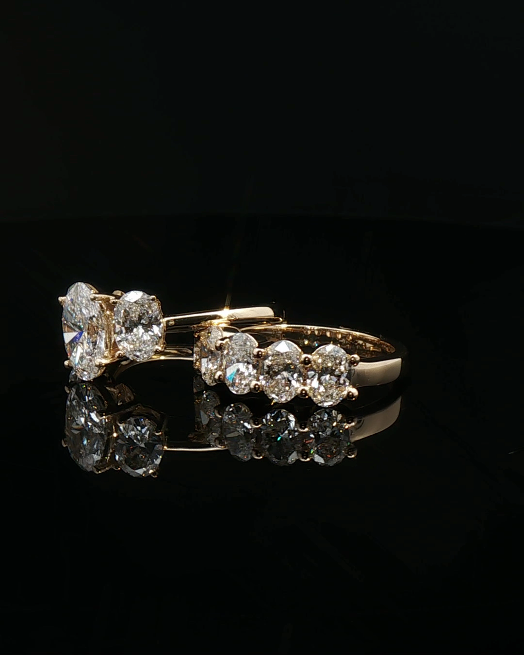 oval cut diamond multistone custom ring yellow gold side view