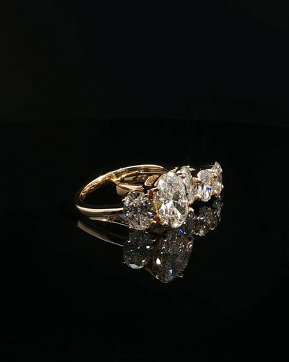oval cut diamond multistone custom ring yellow gold detail view
