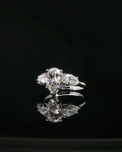 pear cut diamond multistone custom engagement ring platinum front view