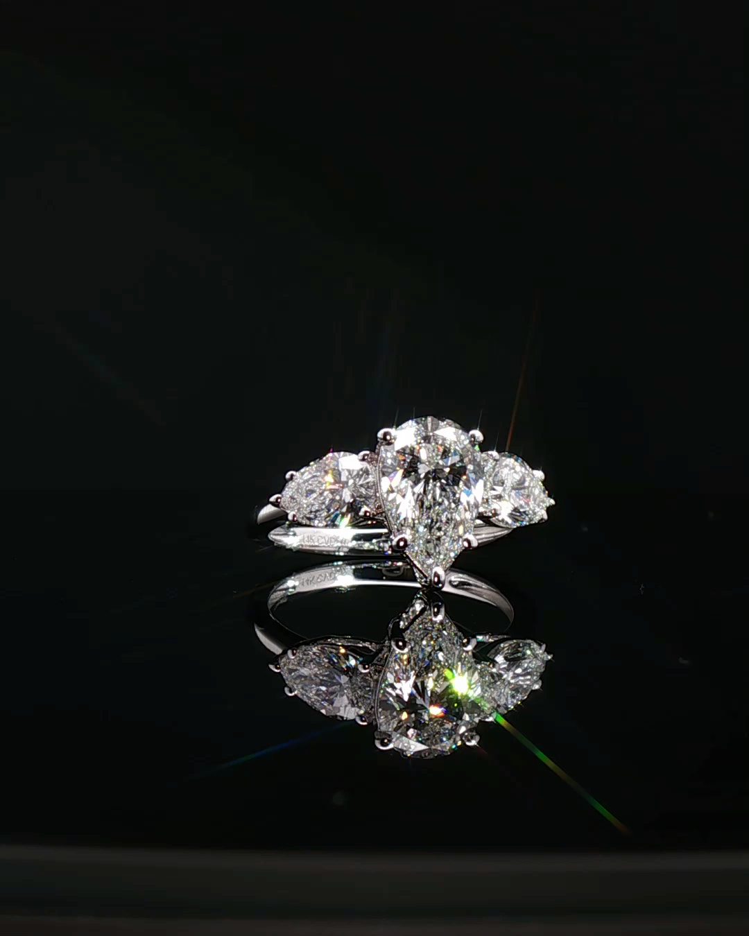 pear cut diamond multistone custom engagement ring platinum white gold front