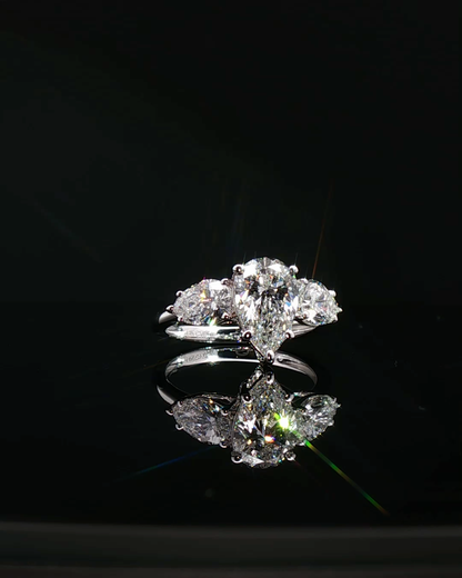 pear cut diamond multistone custom engagement ring platinum white gold front