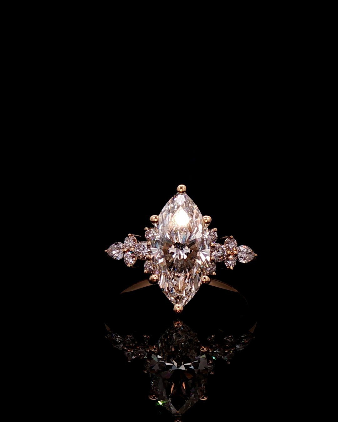 marquise cut diamond multistone custom engagement ring rose gold side view