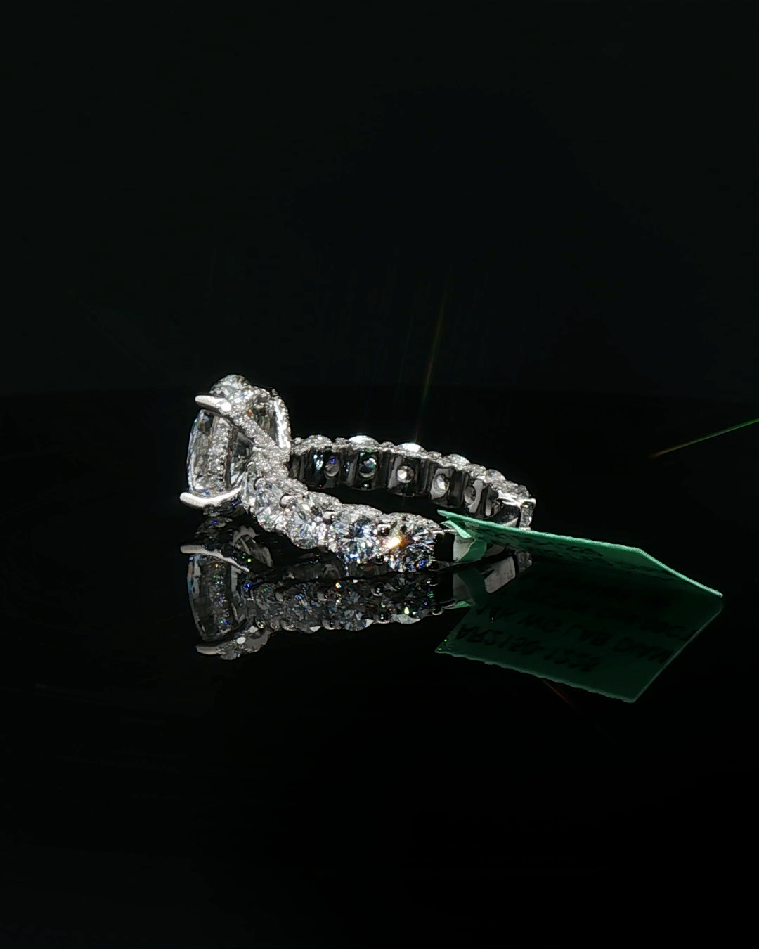 Platinum Multistone Ring with Oval Cut Diamond