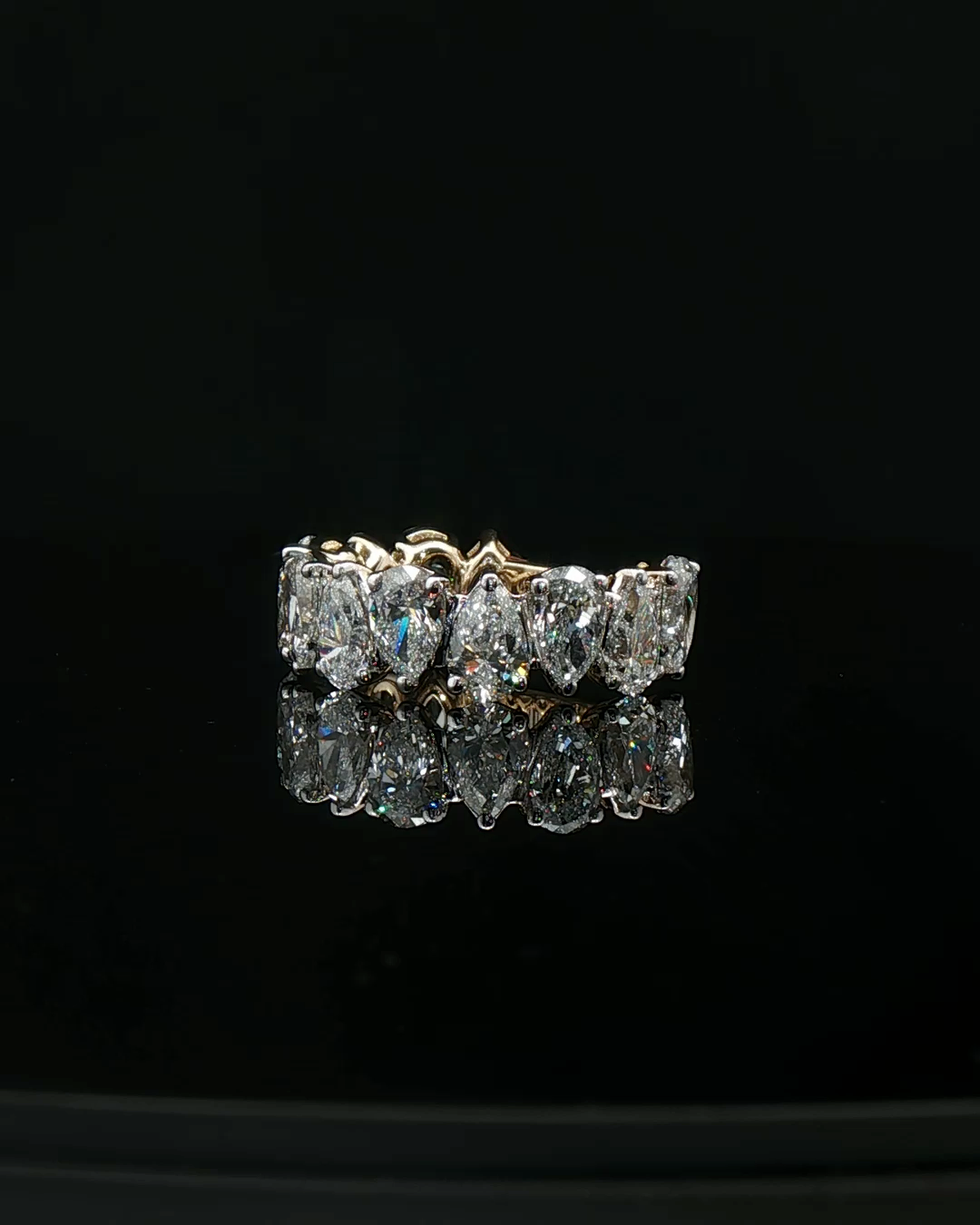 Yellow Gold Eternity Ring with Pear-Shaped Brilliant Cut Diamonds