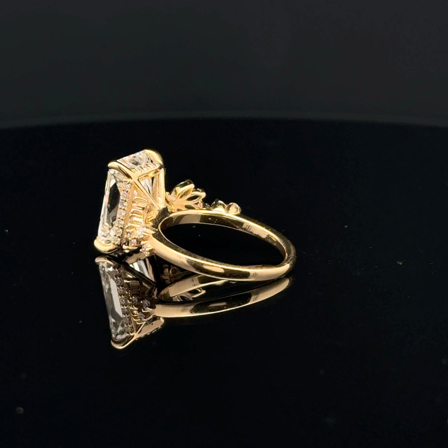 emerald cut diamond multistone custom engagement ring yellow gold detail