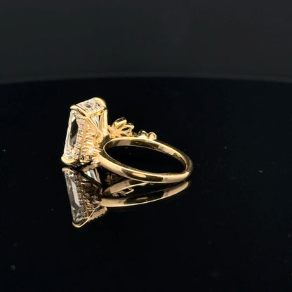 emerald cut diamond multistone custom engagement ring yellow gold detail