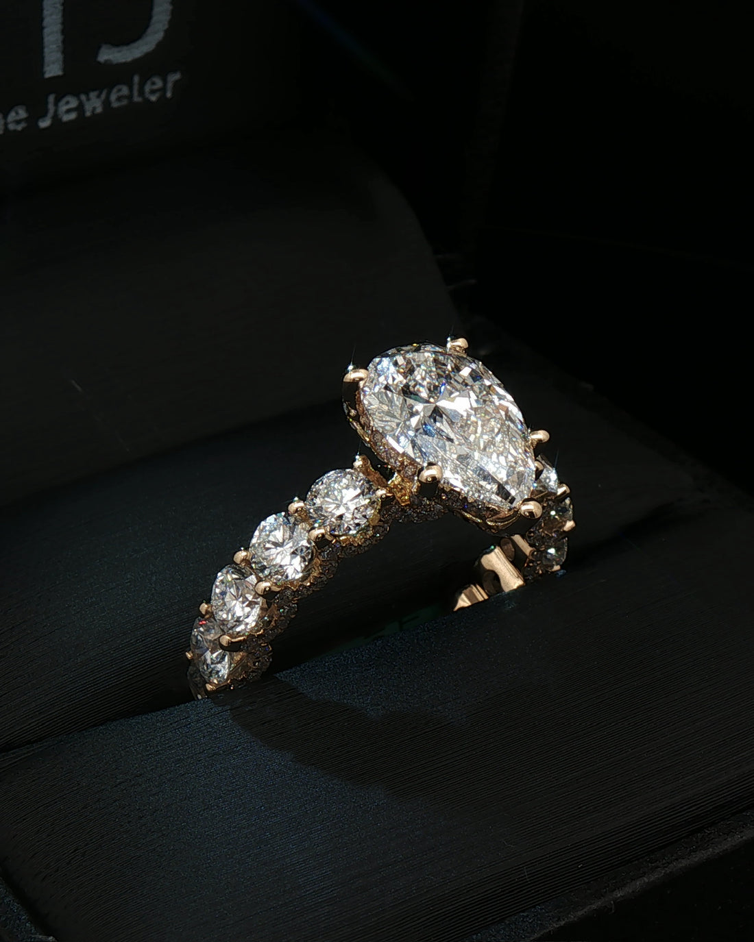 inverted pear cut diamond custom engagement ring 14k yellow gold front view