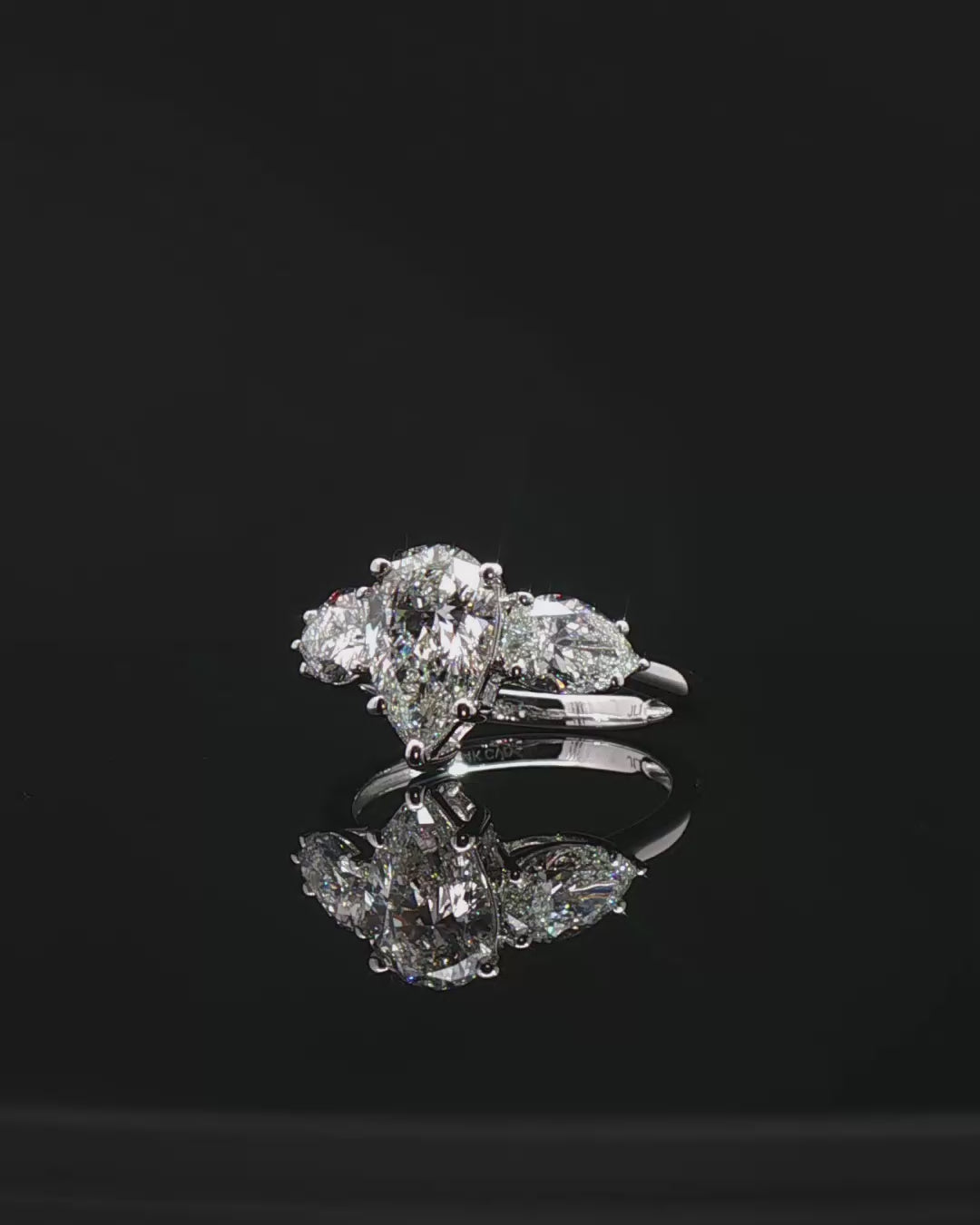 Platinum Multistone Ring with Pear Cut Diamond