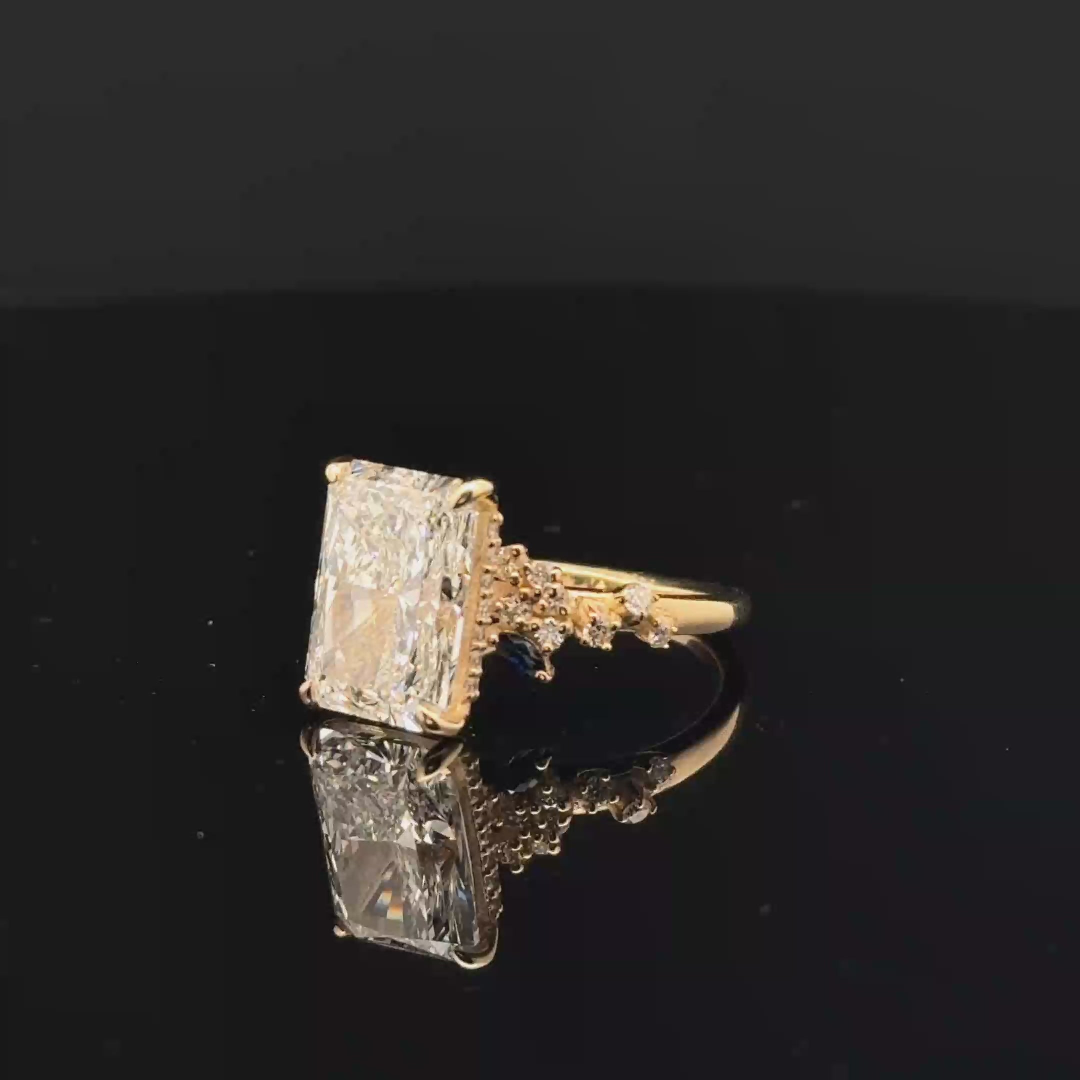 Emerald Cut Diamond Multistone Ring in Yellow Gold