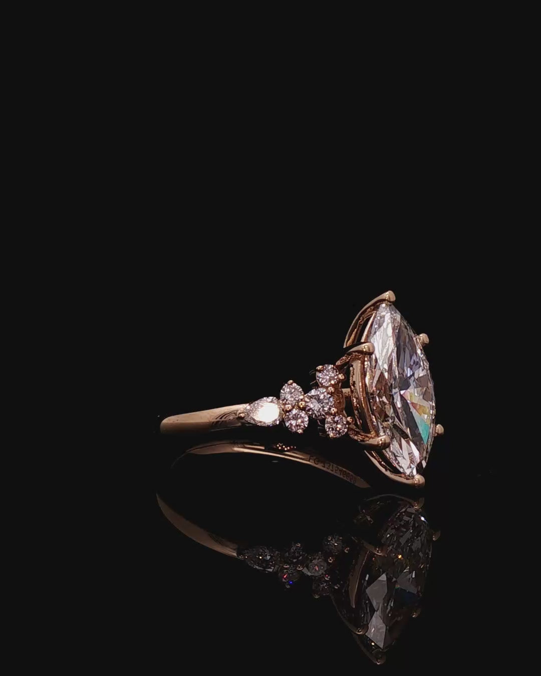 Rose Gold Multistone Ring with Marquise Cut Diamond